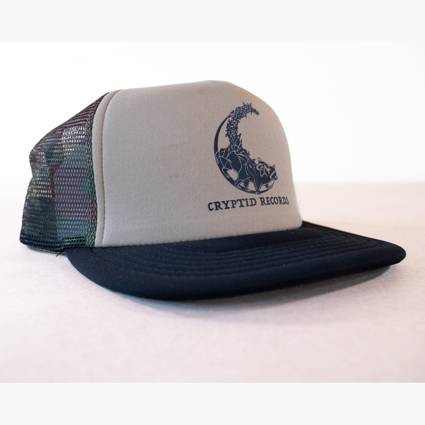 Cryptid Records Raccoon Trucker Hat