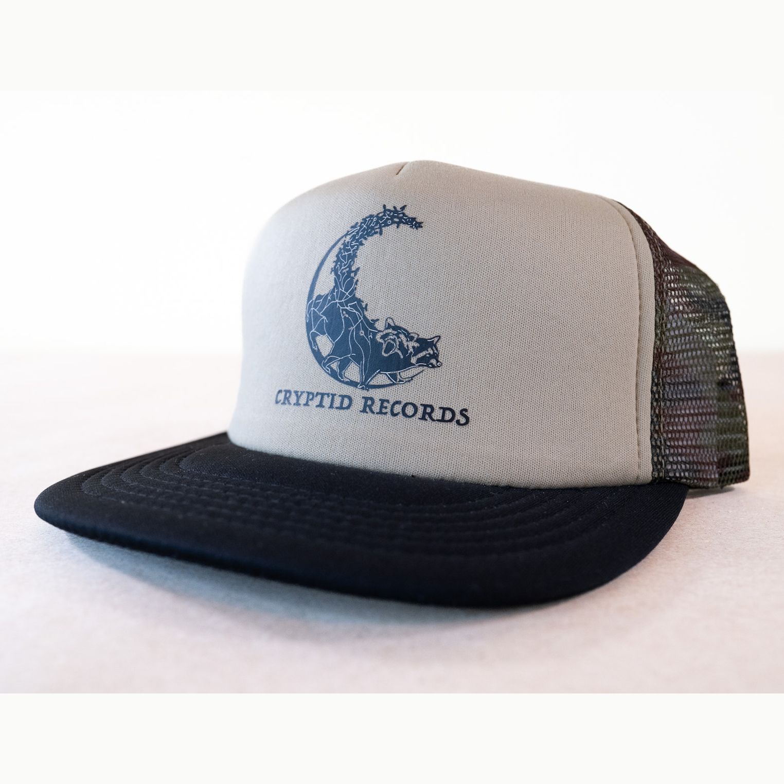 Cryptid Records Raccoon Trucker Hat